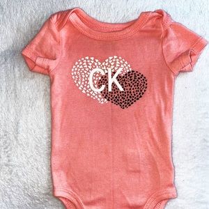 3 Pink Calvin Klein onesies